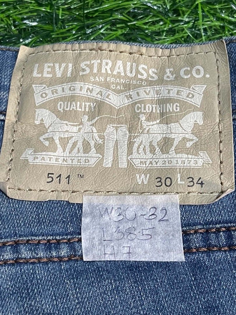 Levi's 511 Jeans W30-32 Blue Denim (Category: Jeans) located in Pangantucan. Submitted by calmwhale_cb83a8 (Listing ID 1466794387, Image 3). Description: - Brand: Levi's 511 - Fit: Slim fit through the leg - Color/Wash: Medium wash blue denim - Details: Classic five-pocket setup, button fly, leather waist patch, and clean hems - Condition: Great everyday denim piece, well-maintained - Mode of Payment: GCash or Bank Transfer - Shipping: Fast shipp