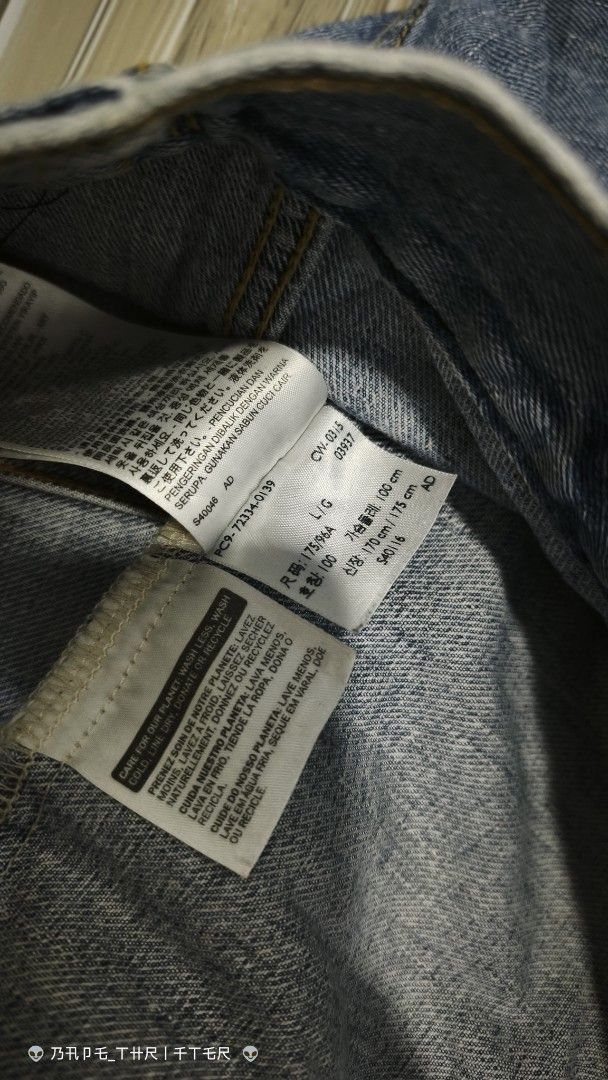 Levi's 72334 Denim Trucker Jacket Size L (Category: Coats, Jackets and Outerwear) located in Lingayen. Submitted by c7quiter84444 (Listing ID 1466932362, Image 3). Description: - Brand: Levi's - Style: Denim Trucker Jacket (Style #72334) - Wash: Light wash with yellow contrast stitching - Size: Large (Relaxed fit) - Material: 100% Cotton - Features: Metal button-front closure, two chest flap pockets, two side welt pockets, iconic red tab, and int