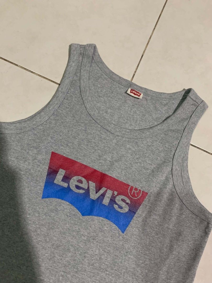 Levi’s Batwing Logo Stretchable Tanktop (Category: Tshirts & Polo Shirts ) located in Dipolog. Submitted by ethrifttt (Listing ID 1466938562, Image 2). Description: Levi’s Batwing Logo Stretchable Tanktop 16.5 x 25.5 excellent condition, no issue good asnew need wash only.