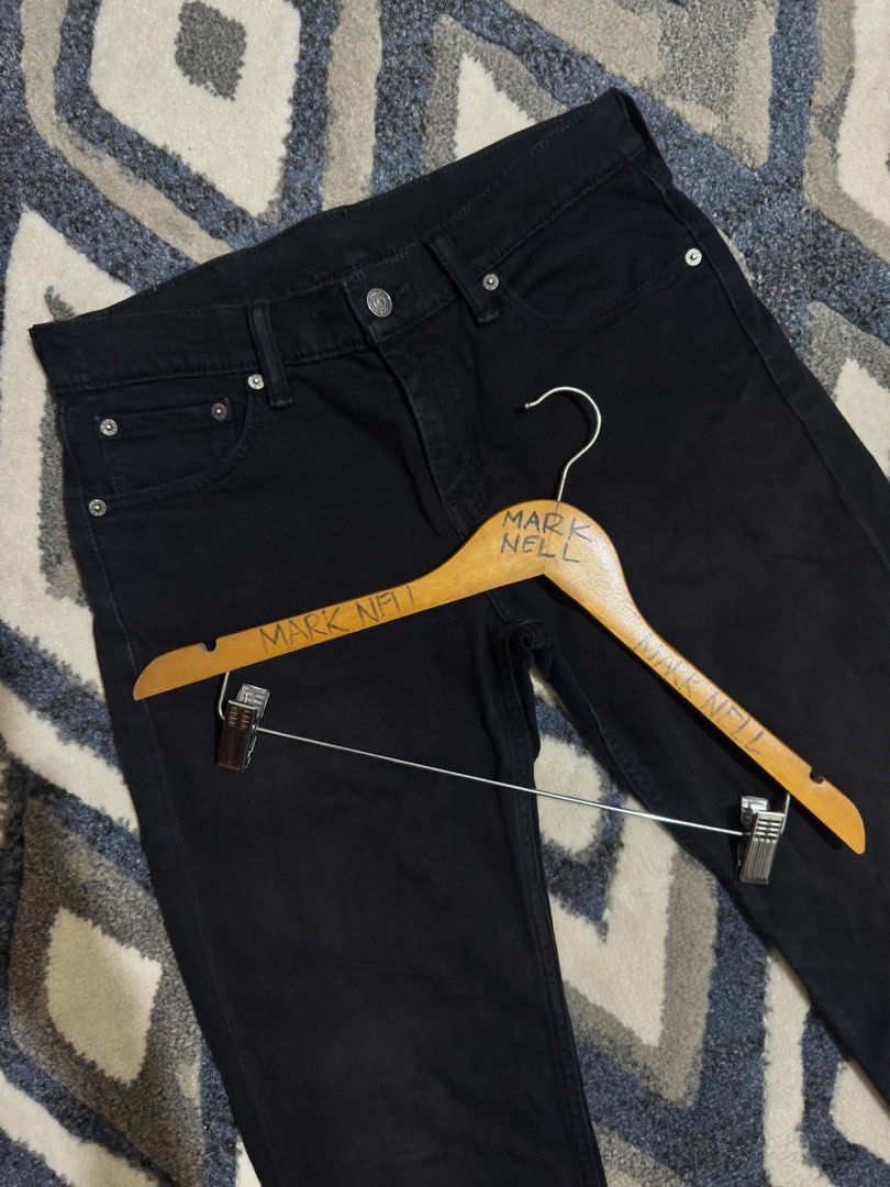 Levi's Black Denim Jeans (Category: Jeans) located in Caloocan City. Submitted by mrknll (Listing ID 1466870300, Image 3). Description: - Brand: Levi's - Color: Classic black with clean dark wash - Fit/Style: Everyday staple with minimal fading - Closure: Standard button fly - Pockets: Classic five-pocket layout - Details: Back leather patch and signature red tab branding.