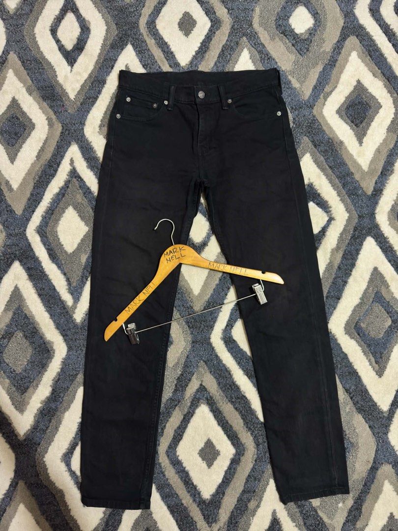 Levi's Black Denim Jeans (Category: Jeans) located in Caloocan City. Submitted by mrknll (Listing ID 1466870300, Image 1). Description: - Brand: Levi's - Color: Classic black with clean dark wash - Fit/Style: Everyday staple with minimal fading - Closure: Standard button fly - Pockets: Classic five-pocket layout - Details: Back leather patch and signature red tab branding.