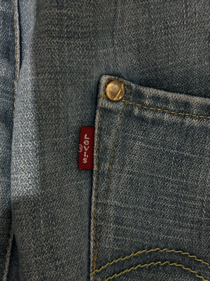 Levi's Blue Denim Jeans (Category: Jeans) located in Manila. Submitted by yarzkyhan (Listing ID 1466859364, Image 3). Description: - Negotiable price - Can do meetups around mnl - Brand: Levi's - Style: Classic five-pocket with button fly - Wash: Light wash with natural fading on thighs and knees - Details: Iconic red tab on back pocket, trendy raw frayed hems - Condition: Sturdy denim with great vintage character.
