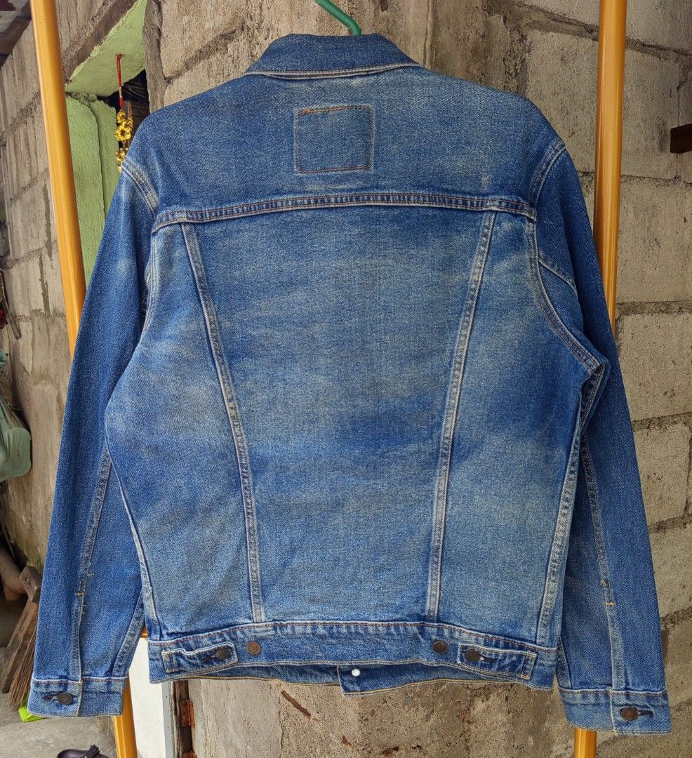 Levi's men's trucker jacket type 3 (Category: Coats, Jackets and Outerwear) located in Lucena. Submitted by aldrinnicodemus (Listing ID 1466863797, Image 2). Description: For sale❗❗ Levi's men's trucker jacket type 3 Made in mexico Dimes Width 22 Length 25.5 Sleeves 25 Shoulder 19.5 Medium on tag No issue Good condition 1500 plus shipping fee Location📍 malolos, bulacan Dm📩.