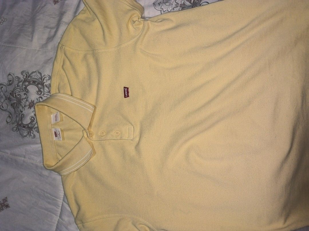 Levi's Yellow Polo Shirt Size M (Category: Tshirts & Polo Shirts ) located in Manila. Submitted by snooks1938 (Listing ID 1466873884, Image 3). Description: For Sale... YELLOW LEVI'S POLO SHIRT GOOD AS NEW.. - Brand: Levi's - Style: Standard fit polo shirt - Color: Yellow with white collar stripes - Details: Button placket, ribbed collar, and small red chest logo tab - Size: Medium FREE SHIPPING.. GLORY BE TO GOD.. .