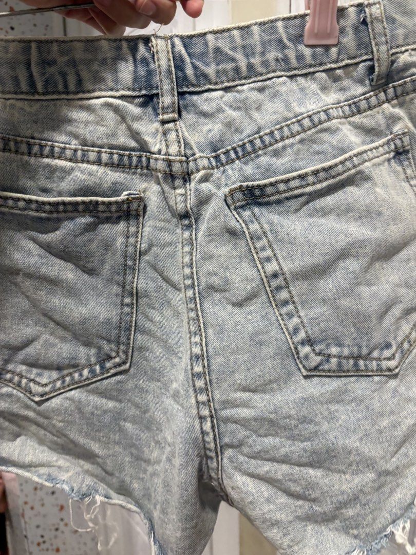 Light wash distressed denim shorts size 28-30 (Category: Shorts) located in Mandaluyong City. Submitted by shopwithjuu (Listing ID 1466812596, Image 2). Description: S28-30 stretchable Light wash acid wash denim shorts with a high-waisted fit, distressed details, and a raw hem. Perfect casual style for the PH weather!.