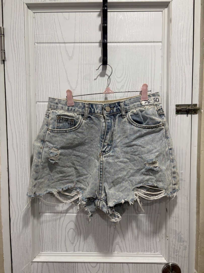 Light wash distressed denim shorts size 28-30 (Category: Shorts) located in Mandaluyong City. Submitted by shopwithjuu (Listing ID 1466812596, Image 1). Description: S28-30 stretchable Light wash acid wash denim shorts with a high-waisted fit, distressed details, and a raw hem. Perfect casual style for the PH weather!.