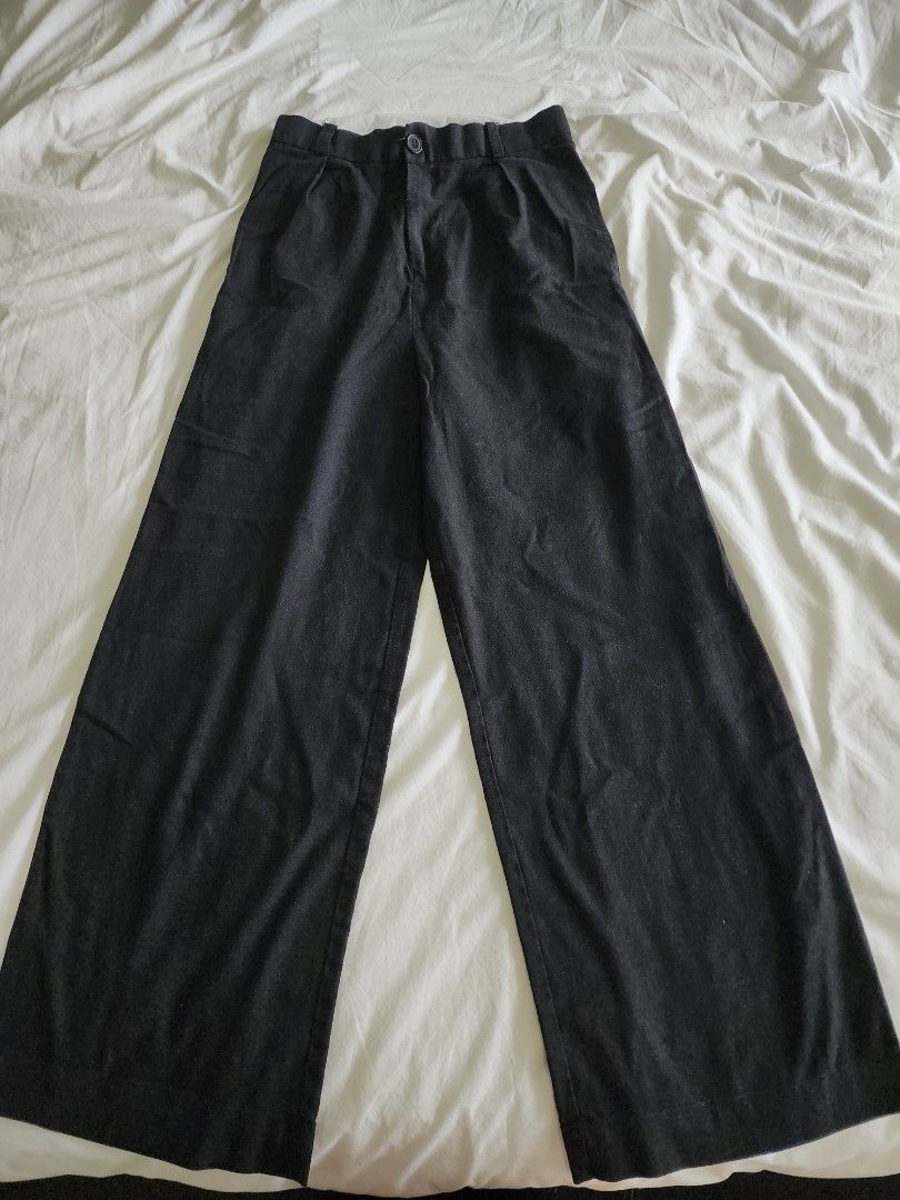 Linen Lab Black Wide Leg Linen Pants (Category: Jeans) located in Cebu City. Submitted by groovefunknsoul (Listing ID 1466864030, Image 1). Description: - Color: Dark grey - Material: Lightweight and breathable linen - Size: M (tagged on waistband) - Closure: Front button with belt loops - Fit: Relaxed, wide leg style.