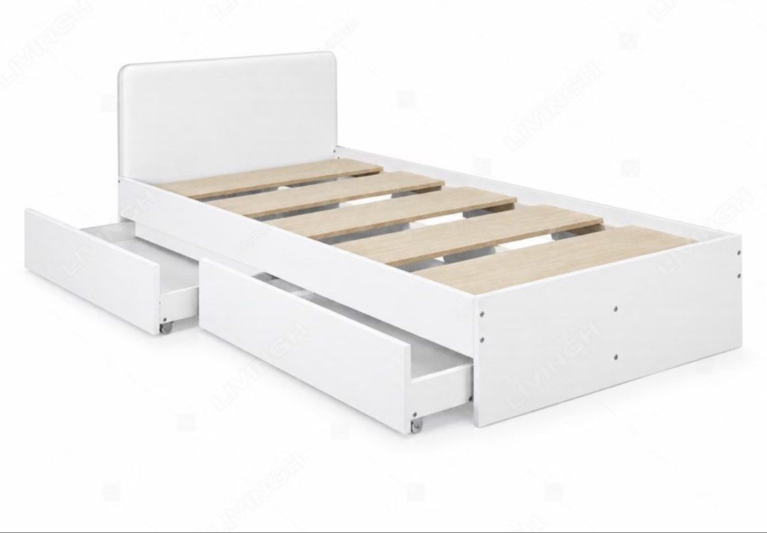 Livingh Storage Drawers for Single Bed (Category: Bed Frames & Mattresses) located in Manila. Submitted by eeerk (Listing ID 1466855111, Image 2). Description: - Includes 2 under-bed sliding storage drawers on wheels - Comfortable cushioned headboard included - Wooden slats included for mattress support - Space-saving design, ideal for smaller bedrooms - Clean white finish matches any interior - Reason for selling: Room makeover - Pickup only.