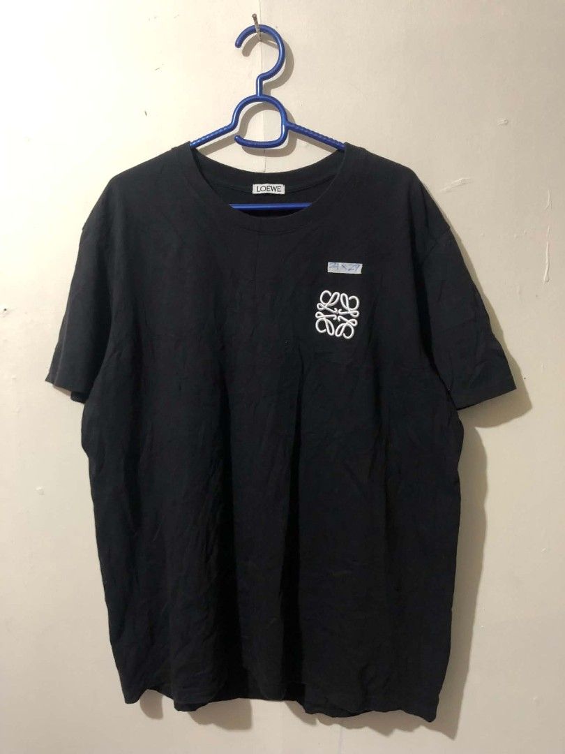 LOEWE Anagram Shirt (Category: Tshirts & Polo Shirts ) located in Pasig City. Submitted by geloangelo17550 (Listing ID 1466962547, Image 1). Description: Excellent condition 9/10 color rate Size Medium Issue cut washtag.