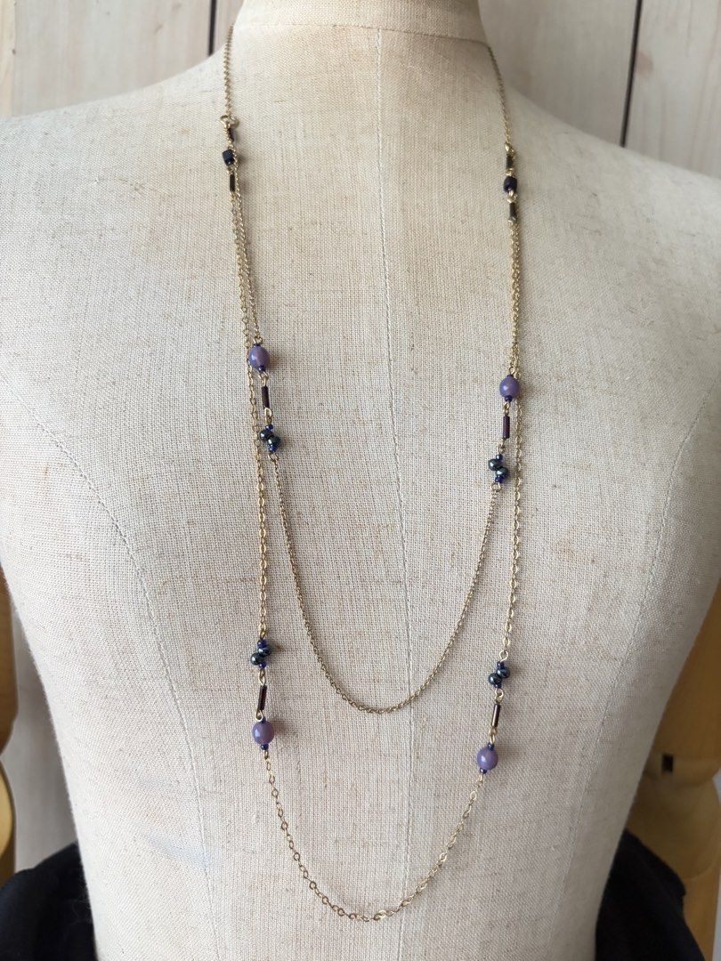 Long Double Strand Purple Beaded Necklace (Category: Necklaces) located in Quezon City. Submitted by wagwagan_ukay_blues (Listing ID 1466856770, Image 1). Description: From Japan In good condition Fashion Only 32” length.