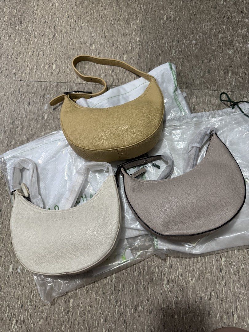 Longchamp Boxford Crescent Shoulder Bag Leather (Category: Luxury Bags & Wallets) located in Imus. Submitted by avielicious (Listing ID 1466910811, Image 3). Description: - Brand new Longchamp crescent shoulder bag - Available in 3 neutral tones: cream, taupe, and pale yellow - Premium textured leather material - Secure zipper closure - Adjustable shoulder strap - Chic debossed Longchamp logo on the front - Elegant silver-tone hardware - Protecti