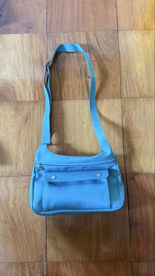 Longchamp Crossbody Messenger bag (Category: Cross-body Bags) located in Makati City. Submitted by thevault88 (Listing ID 1466858055, Image 1). Description: - Brand: Longchamp - Style: Crossbody / Messenger bag - Color: Teal Blue - Features: Front flap pocket, secure zipped main compartment, and branded adjustable strap - Condition: Good and well-maintained - Perfect for daily use, errands, or casual outings.