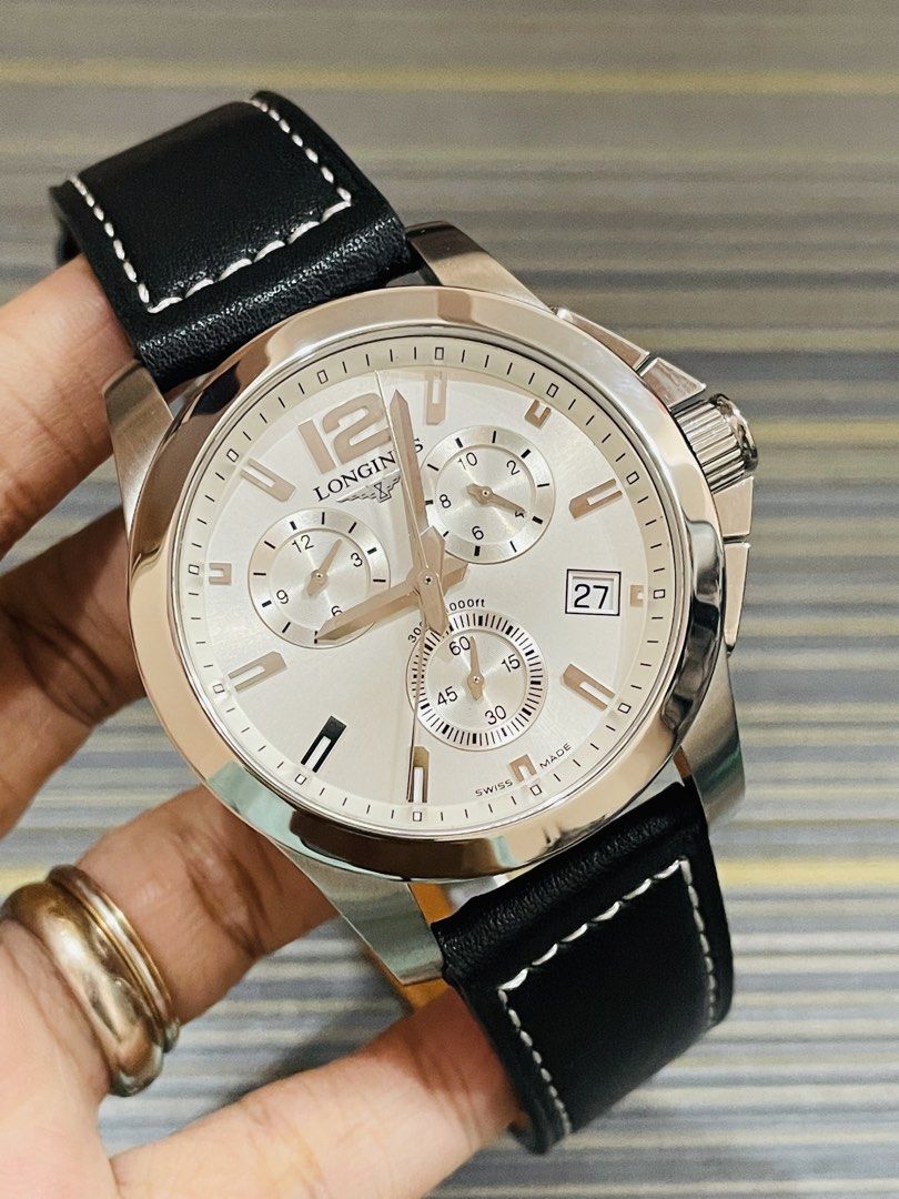 Longines Conquest Chronograph Silver Dial Leather Strap Watch (Category: Men's Watches) located in Paranaque City. Submitted by kjoyyy (Listing ID 1466930976, Image 2). Description: Longines Conquest Chronograph Mens L3.660.4 Swiss Quartz Movement 41mm bezel; 45mm including crown Original buckle with new leather strap aftermarket Good running condition Preloved used watch Authentic/Original Watch only!! with provided box ordinary.