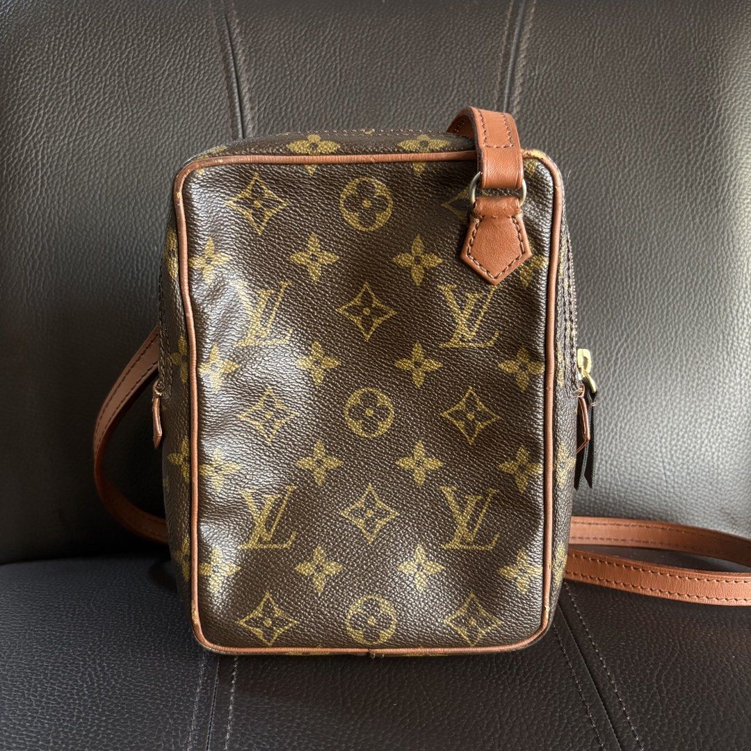 Louis Vuitton Amazone (Category: Luxury Accessories) located in Baliuag. Submitted by northfnds (Listing ID 1466860759, Image 2). Description: The image shows a vintage Louis Vuitton Monogram Amazone crossbody bag crafted in the signature brown monogram canvas with natural vachetta leather trim and an exterior front zip pocket.