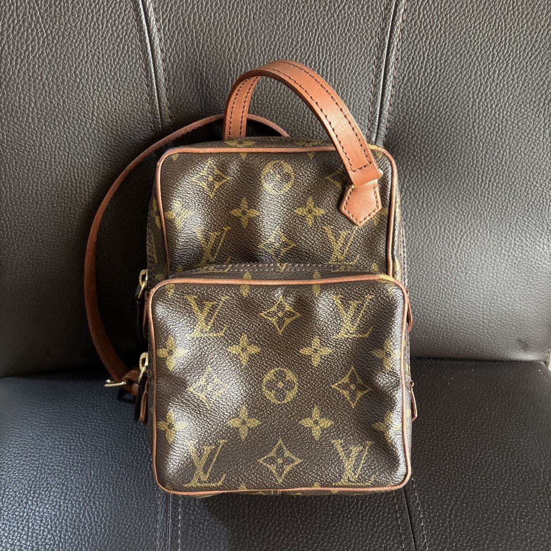 Louis Vuitton Amazone (Category: Luxury Accessories) located in Baliuag. Submitted by northfnds (Listing ID 1466860759, Image 1). Description: The image shows a vintage Louis Vuitton Monogram Amazone crossbody bag crafted in the signature brown monogram canvas with natural vachetta leather trim and an exterior front zip pocket.