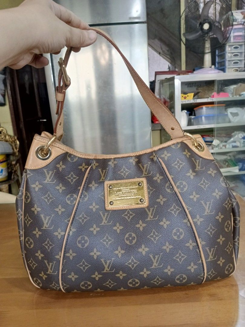 Louis Vuitton Monogram Canvas Shoulder Bag AUTHENTIC (Category: Luxury Bags & Wallets) located in Quezon City. Submitted by katherinehernandez25323 (Listing ID 1466780414, Image 1). Description: - Authentic Louis Vuitton monogram canvas with brown and gold tones - Premium tan leather trim and adjustable shoulder strap - Luxurious gold-tone hardware featuring the LV Inventeur front plaque - Spacious interior perfect for daily essentials - Protecti
