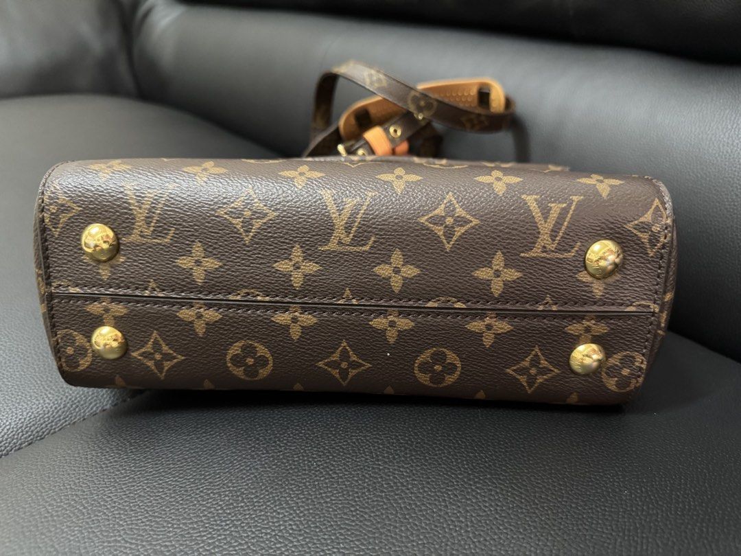 Louis Vuitton Monogram Canvas Handbag (Category: Luxury Bags & Wallets) located in Taguig. Submitted by kittychum (Listing ID 1466880921, Image 3). Description: 💯Authentic Preloved Condition: 7-8/10 No original strap With minimal signs and unnoticeable signs Inclusion: provided dust bag and provided leather authentic LV strap .