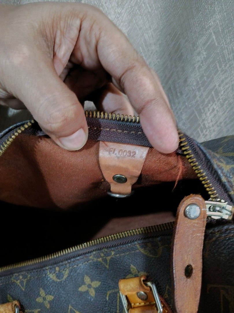 Louis Vuitton Monogram Canvas Speedy Handbag (Category: Shoulder Bags) located in Davao. Submitted by sweet-sweet (Listing ID 1466929975, Image 3). Description: - Classic brown monogram canvas with smooth gold-tone zipper closure - Clean brown fabric interior lining - Leather handles exhibit a natural honey patina and normal darkening from gentle use - Condition: Well-maintained, classic vintage appeal.