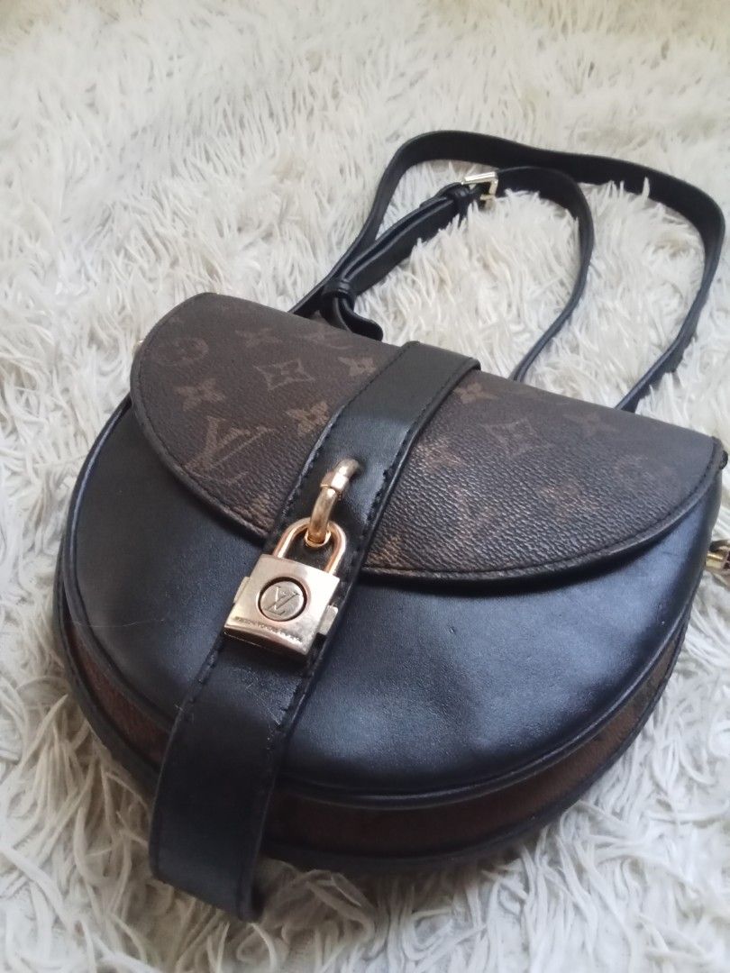 Louis Vuitton Monogram Eclipse Metis Saddle Bag (Category: Luxury Bags & Wallets) located in Caloocan City. Submitted by noy5o1a (Listing ID 1466802087, Image 2). Description: - Louis Vuitton saddle bag - Monogram canvas paired with durable black leather - Front strap closure accented with a gold-tone padlock - Includes an adjustable black shoulder strap for comfortable wear - Black interior lining featuring a convenient slip pocket - Perfect lux