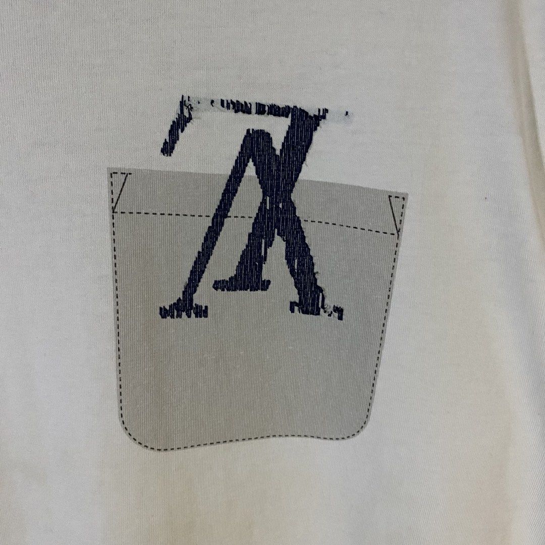 Louis Vuitton Printed Pocket Tee (Category: Luxury Apparel) located in Baguio. Submitted by goodfinds2600v2 (Listing ID 1466886580, Image 2). Description: Size on tag: L fits XL Dimensions: L-30.5 W/Bust-24 Description: unisex Condition: Good Issue/s: light stains, faded print .