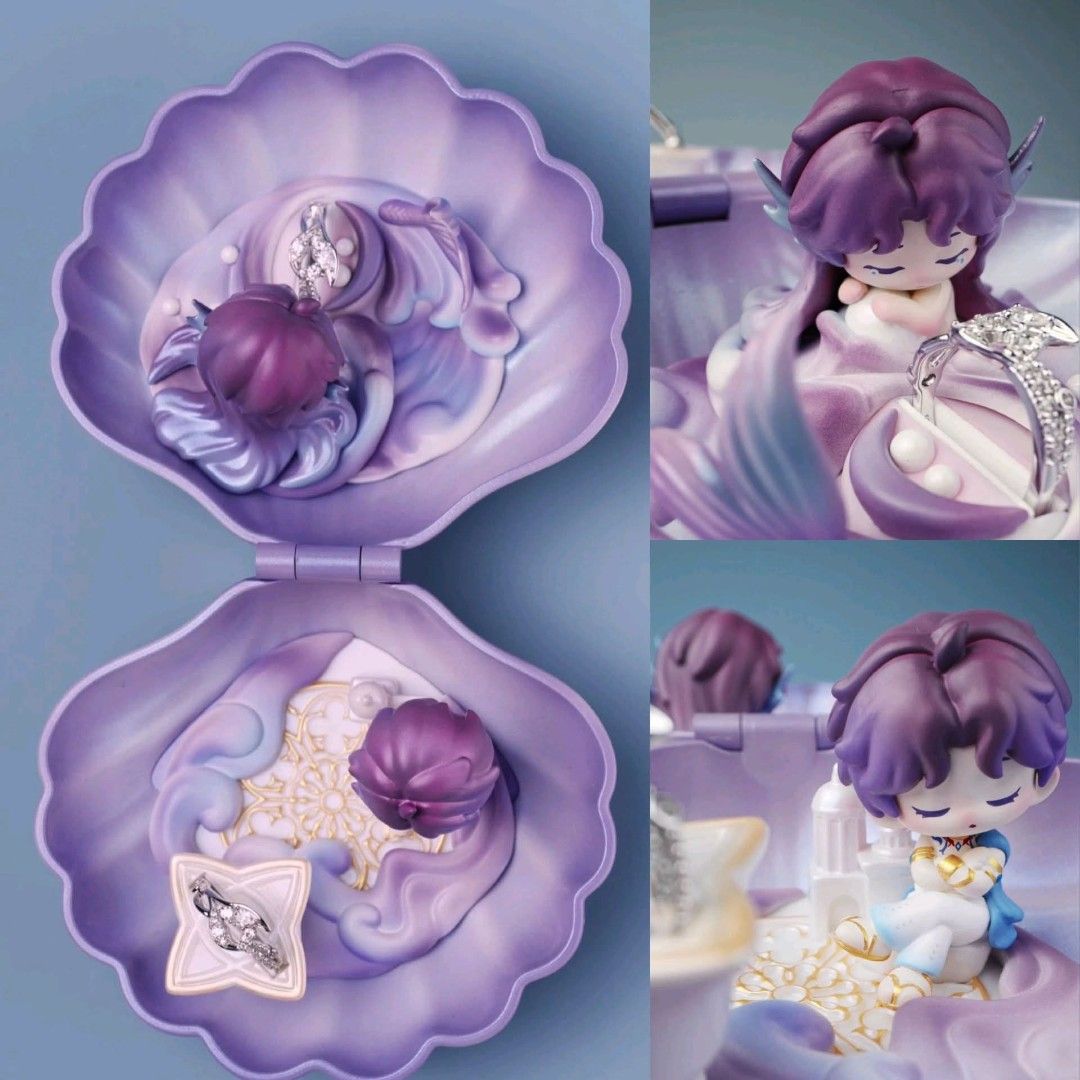 Love and Deepspace Rafayel Poseidon Series Shell Ring Box (Category: Figurines & Statues) located in Tarlac. Submitted by redbluehatter (Listing ID 1466845504, Image 1). Description: 1 shell ring box includes: 2x Rafayel figure placed on both sides 2x ring holders 1 with each Rafayel Comes with Gift Benefits: 1 double sided light reflecting card 1 set of 4 cards THIS IS A FAN MADE AND BOUGHT STRAIGHT FROM CHINA, PRICE INCLUDES ISF AND SF *figure 