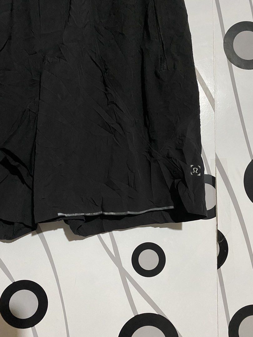 Lululemon athletic shorts (Category: Shorts) located in Cebu City. Submitted by patspickph (Listing ID 1466828411, Image 2). Description: This is a Lululemon athletic shorts for training/running short featuring an elastic waistband with an internal drawcord, side pockets, and the signature Lululemon logo detail near the hem. Size Medium on tag Free size waistline and length is 16inches. Good Condition👍.