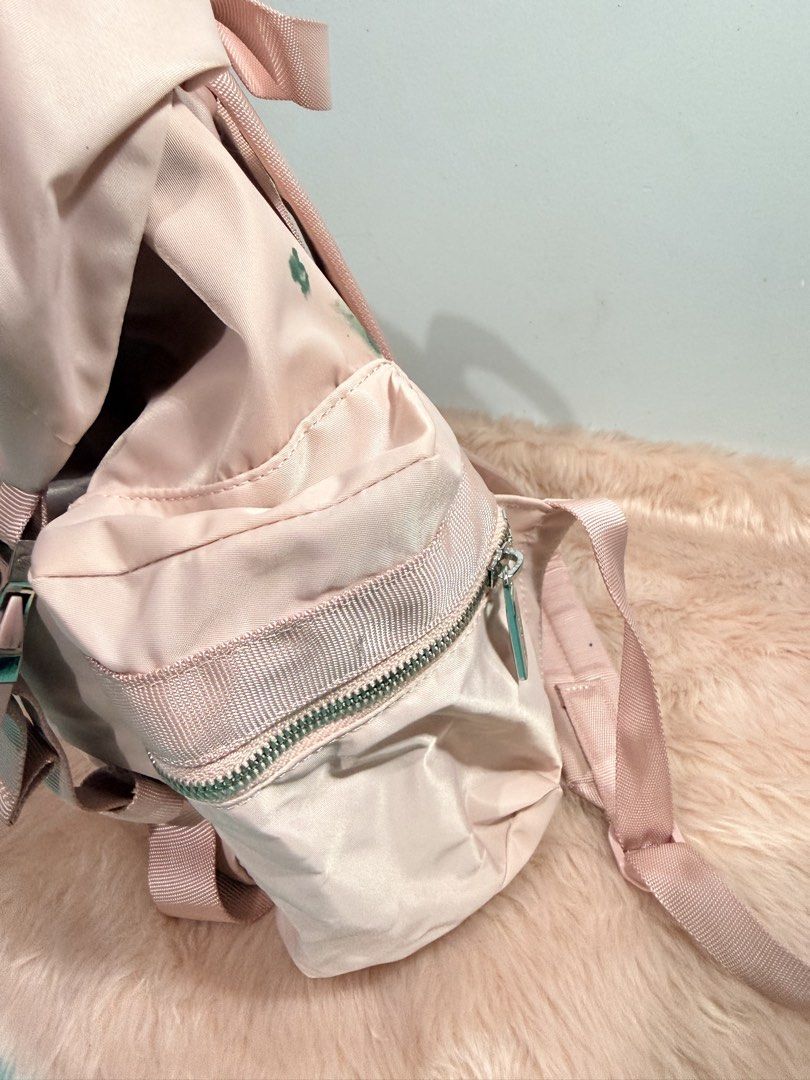 Lululemon City Adventurer Backpack Light Pink (Category: Backpacks) located in Quezon City. Submitted by shaberbree (Listing ID 1466910914, Image 2). Description: - Brand: Lululemon - Model: City Adventurer Backpack - Color: Light Pink - Closure: Drawstring with dual front metal buckles - Features: Padded shoulder straps, top handle, exterior side zip pockets, interior laptop sleeve, and zippered pocket - Condition: Clean overall and fully functi