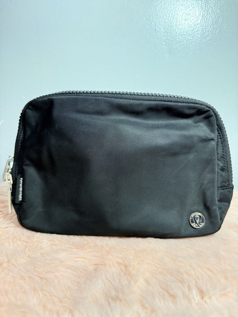 Lululemon Everywhere Belt Bag Large Black (Category: Belt bags, Clutches and Pouches) located in Quezon City. Submitted by shaberbree (Listing ID 1466907485, Image 1). Description: Black Lululemon Everywhere Belt Bag Large. Brand new with original store tags attached. Water-repellent fabric, roomy main compartment, multiple interior pockets, adjustable strap with buckle closure. Classic everyday hands-free bag for phone, keys, and wallet..