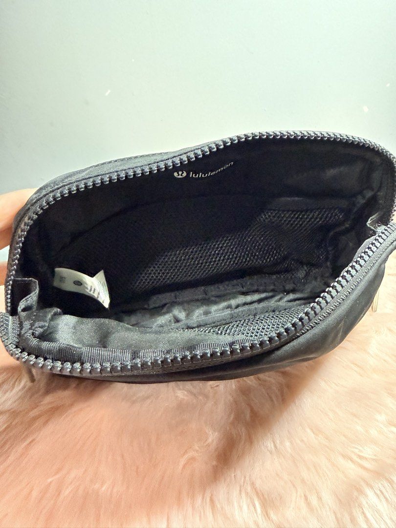 Lululemon Everywhere Belt Bag Large Black (Category: Belt bags, Clutches and Pouches) located in Quezon City. Submitted by shaberbree (Listing ID 1466907485, Image 3). Description: Black Lululemon Everywhere Belt Bag Large. Brand new with original store tags attached. Water-repellent fabric, roomy main compartment, multiple interior pockets, adjustable strap with buckle closure. Classic everyday hands-free bag for phone, keys, and wallet..