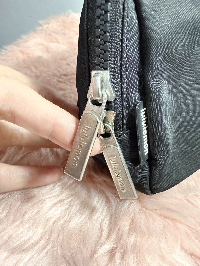 Lululemon Everywhere Belt Bag Large Black (Category: Belt bags, Clutches and Pouches) located in Quezon City. Submitted by shaberbree (Listing ID 1466907485, Image 2). Description: Black Lululemon Everywhere Belt Bag Large. Brand new with original store tags attached. Water-repellent fabric, roomy main compartment, multiple interior pockets, adjustable strap with buckle closure. Classic everyday hands-free bag for phone, keys, and wallet..