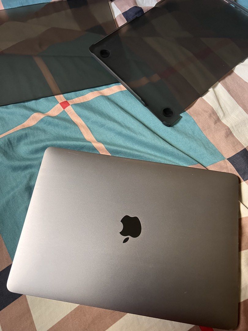 MacBook Pro 2019 13” with touchbar space grey laptop with protective case (Category: Laptops & Notebooks) located in Batac City. Submitted by dejesus1008ken (Listing ID 1466785572, Image 2). Description: Macbook pro 2019 13 inch with touchbar Condition: -Good -Battery Service Recommended walang time magpa ayos -Space Bar not working pwede naman bumili ng external keyboard and goods na -May dents yet may kasama ng case so hindi noticable.. Space g
