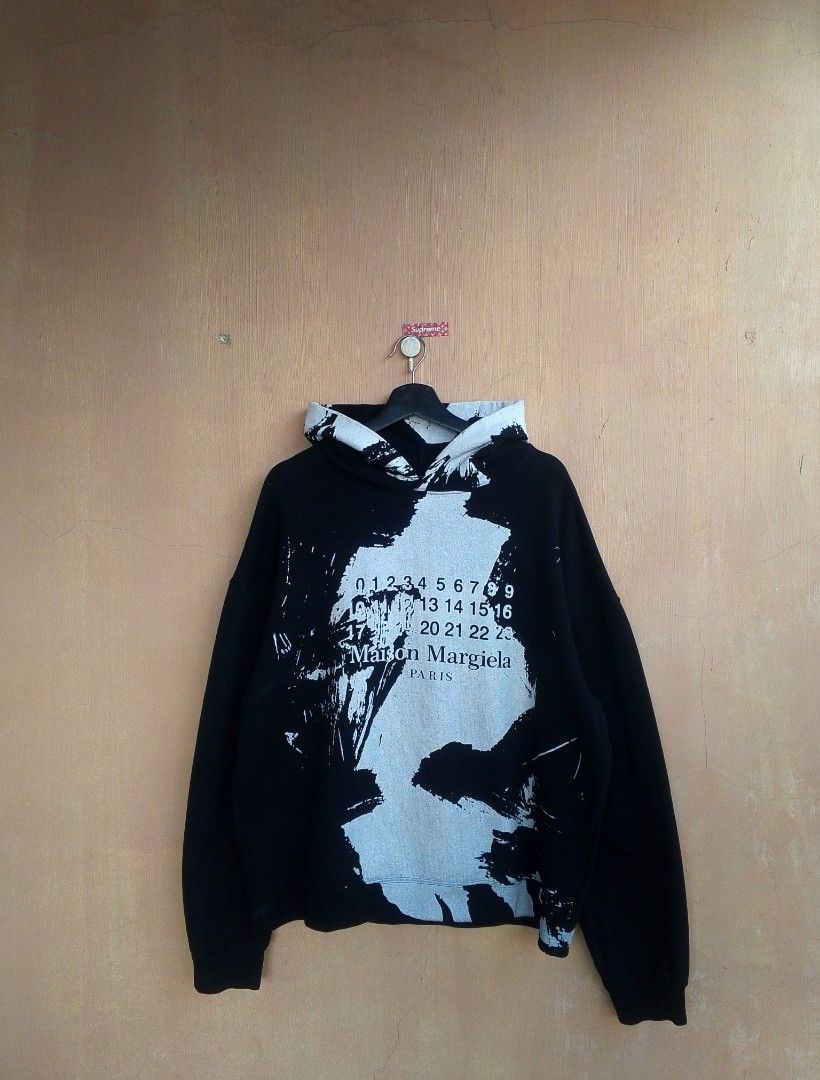Maison Margiela Paint Splash Hoodie Jacket (Category: Luxury Apparel) located in Lipa City. Submitted by MEECHYTWO2TWO (Listing ID 1466907214, Image 1). Description: •MAISON MARGIELA HOODIE - Size: 50 / Best fit L-XL - Width: 24 / Length: 27 - Location: Lipa City, Batangas - Excellent condition - Color rate: 9.8/10 - Additional sf +75 - Mop: GCASH/NO COD - Payment first tomorrow will be shipped.
