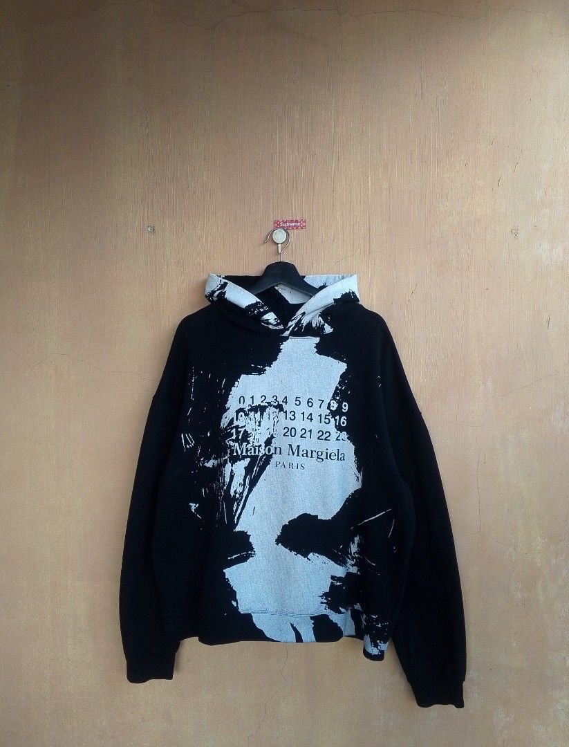 Maison Margiela Paint Splash Hoodie Jacket (Category: Luxury Apparel) located in Lipa City. Submitted by MEECHYTWO2TWO (Listing ID 1466907214, Image 3). Description: •MAISON MARGIELA HOODIE - Size: 50 / Best fit L-XL - Width: 24 / Length: 27 - Location: Lipa City, Batangas - Excellent condition - Color rate: 9.8/10 - Additional sf +75 - Mop: GCASH/NO COD - Payment first tomorrow will be shipped.