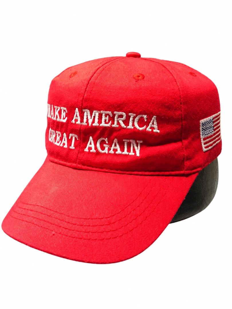 Make America Great Again Red Baseball Cap (Category: Caps & Hats) located in Baguio. Submitted by boneteezandharmony (Listing ID 1466901641, Image 2). Description: - Color: Bright red - Design: White embroidered lettering on the front - Detailing: American flag patch on the right side panel - Structure: Standard 6-panel construction with a curved brim - Closure: Adjustable back - Condition: Clean fabric with crisp embroidery.