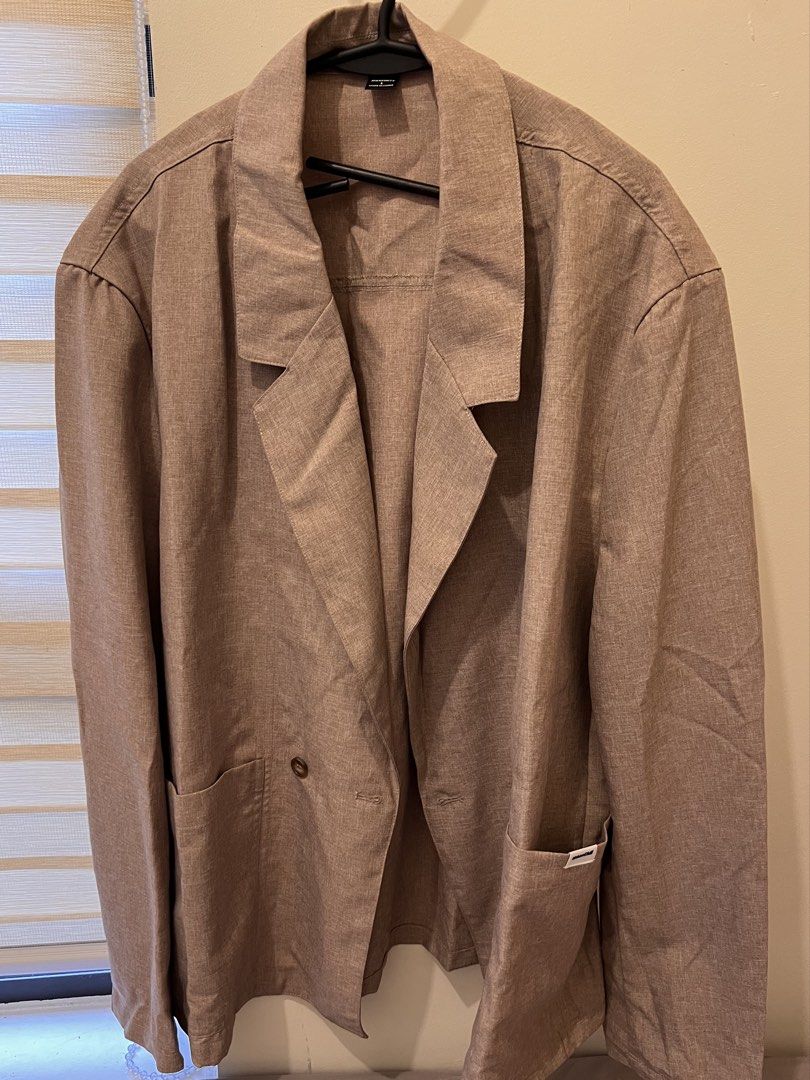 Manfinity Brown Blazer Size L (Category: Coats, Jackets and Outerwear) located in Las Pinas. Submitted by basicapparel_mnl (Listing ID 1466968482, Image 1). Description: - Brand: Manfinity - Color: Nice brown shade - Size: L (label attached at collar) - Closure: Front button - Pockets: Functional front pockets - Fabric: Lightweight with a relaxed drape - Origin: Made in China.