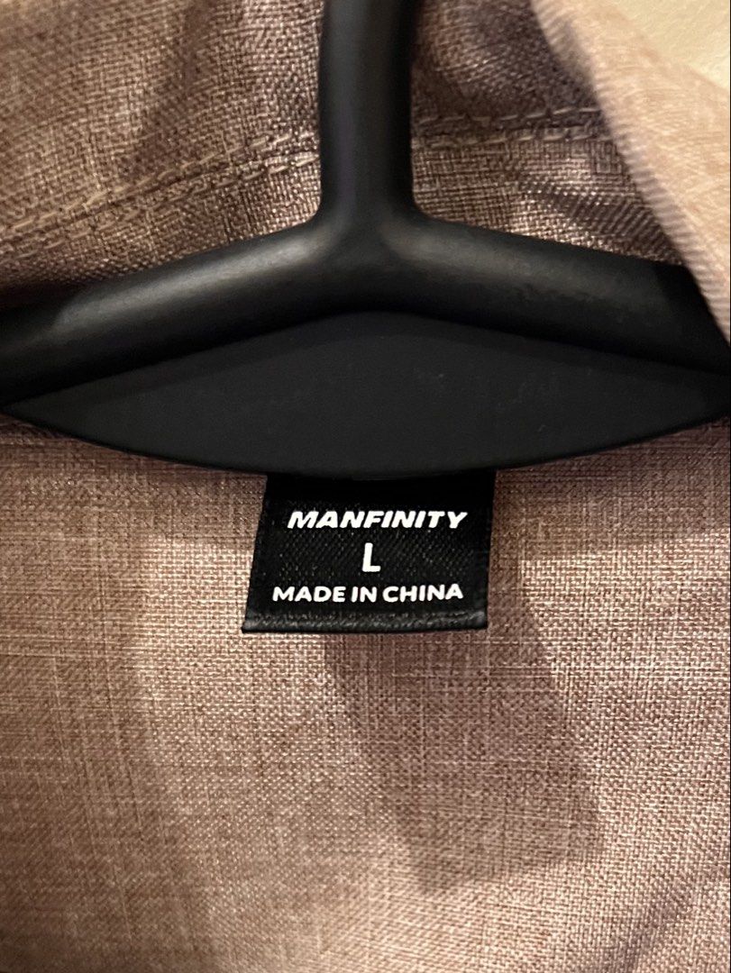 Manfinity Brown Blazer Size L (Category: Coats, Jackets and Outerwear) located in Las Pinas. Submitted by basicapparel_mnl (Listing ID 1466968482, Image 3). Description: - Brand: Manfinity - Color: Nice brown shade - Size: L (label attached at collar) - Closure: Front button - Pockets: Functional front pockets - Fabric: Lightweight with a relaxed drape - Origin: Made in China.