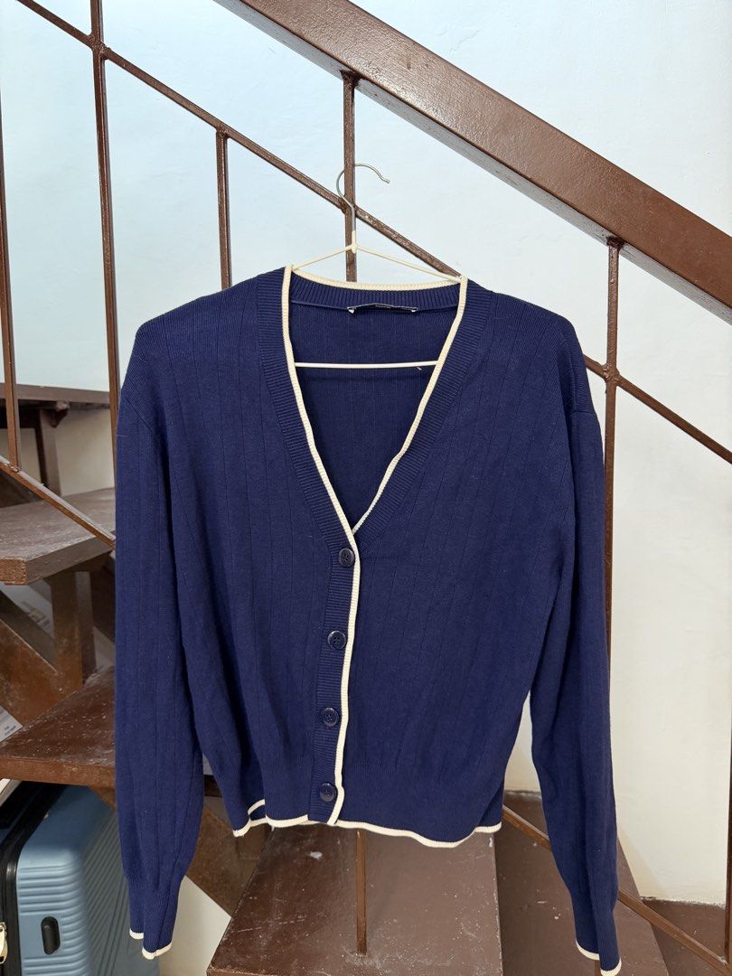MANGO Navy Blue Ribbed Cardigan (Category: Coats, Jackets and Outerwear) located in Makati City. Submitted by bonitaab_ (Listing ID 1466845631, Image 3). Description: Size S. Used 3x only. Super soft on skin, and hindi mainit suotin. I only had to sell this bec it’s a bit big on me :).