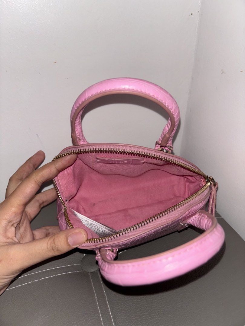 Mango Pink Crocodile Embossed Mini Handbag (Category: Luxury Bags & Wallets) located in Dumaguete. Submitted by shopcee (Listing ID 1466900165, Image 2). Description: Pink mini bag with strap.