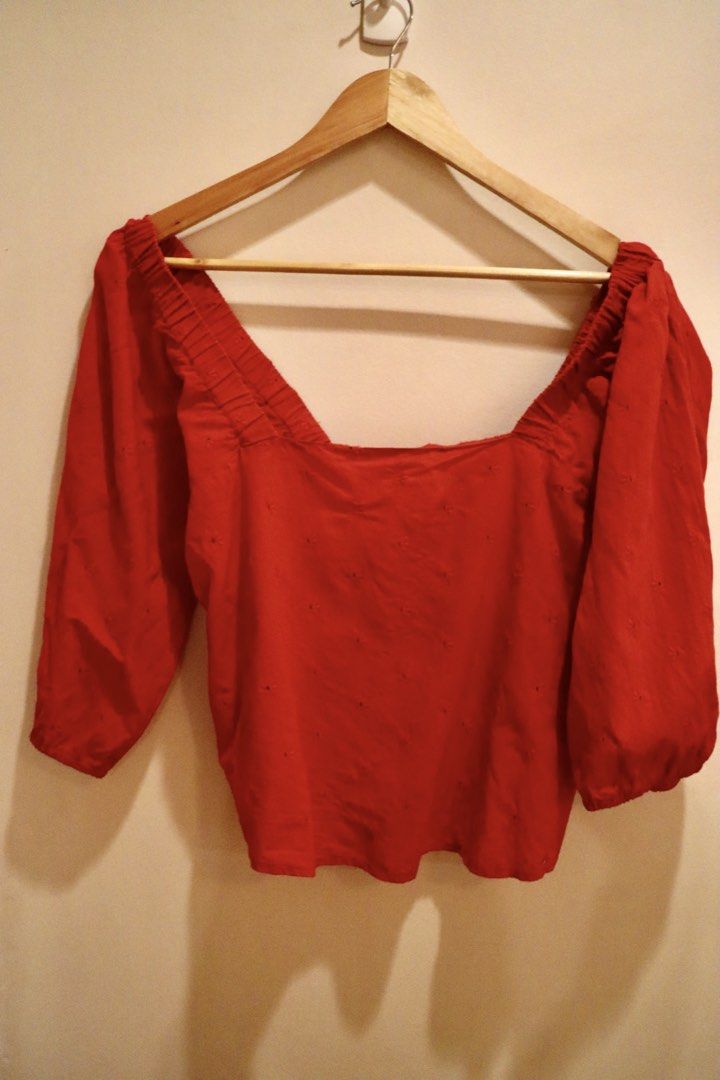 MANGO Red Eyelet Off-Shoulder Top (Category: Blouses) located in Iloilo. Submitted by outofrotation (Listing ID 1466899239, Image 1). Description: Authentic MANGO red eyelet off-shoulder top 🍄fits M-L frames, loose-fitting ✨can be dressed up or down, in great condition.