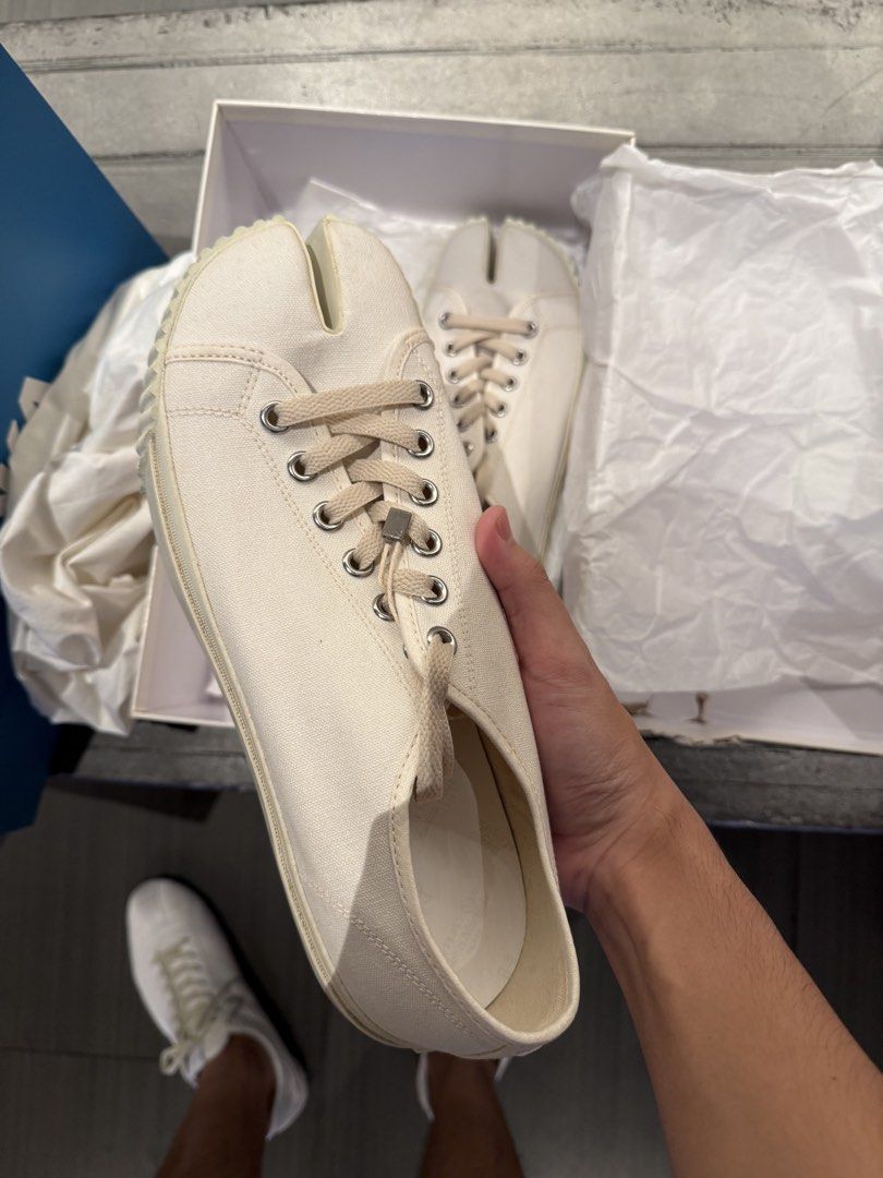 Margiela Tabi Canvas Sneakers (Category: Sneakers) located in Muntinlupa City. Submitted by donpierre.17 (Listing ID 1466909785, Image 1). Description: For sale Margiela Tabi Canvas cream Brand new complete with box & papers Size 42.5 eu / 9.5 us Asking only 22,000 dm for offers.