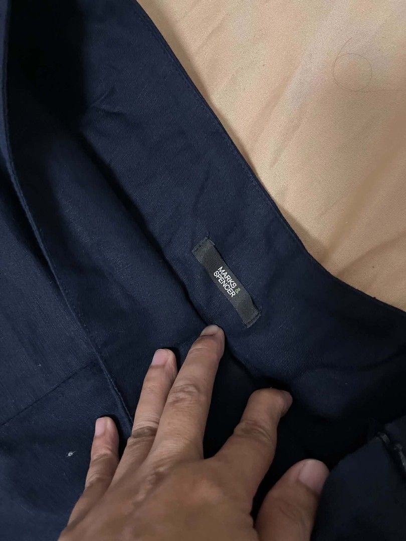 Marks & Spencer Navy Trousers Size UK 12 (Category: Trousers) located in Caloocan City. Submitted by savastrid (Listing ID 1466827149, Image 3). Description: - Brand: Marks & Spencer - Color: Navy Blue - Size: UK 12 / Medium - Closure: Side zipper with structured waistband - Style: Classic office wear / Work trousers - Condition: Clean and well-maintained.