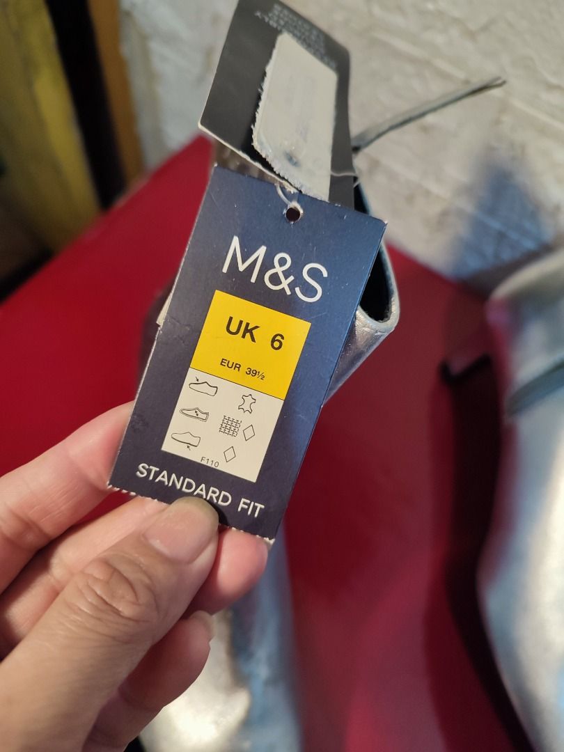 Marks and Spencer Metallic Silver Boots Size UK 6 (Category: Boots) located in Caloocan City. Submitted by jel_gielle (Listing ID 1466934391, Image 3). Description: - Brand: Marks & Spencer - Style: Metallic silver kitten heel ankle boots with square toe and side zippers - Size: UK 5 / EUR 38 - Condition: Brand new with tags attached (Original Price: PHP 4,950) - Material: Non-leather, 100% vegan friendly - Country of Origin: Made in Cambodia.
