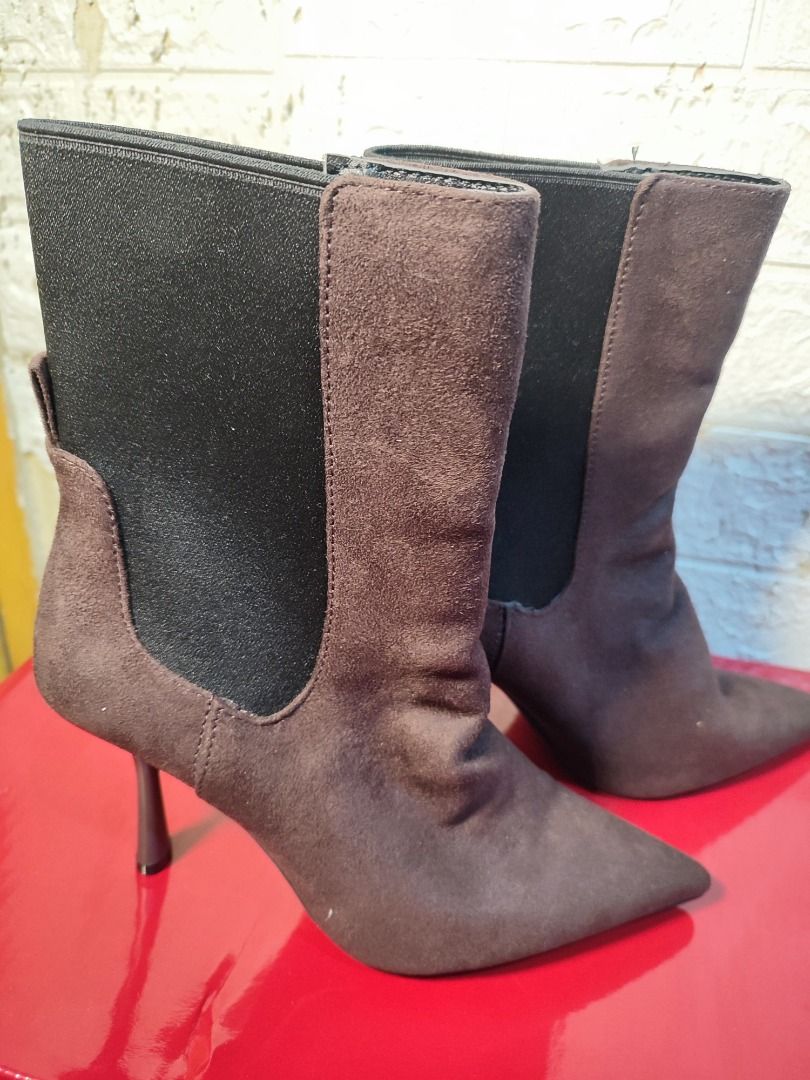 Marks and Spencer Pointed Stiletto Heel Ankle Boots (Category: Boots) located in Caloocan City. Submitted by jel_gielle (Listing ID 1466935083, Image 2). Description: - Brand: Marks and Spencer - Style: Heeled ankle boots with pointed toe and high stiletto heels - Color: Espresso brown - Size: UK 5 / EUR 38 - Features: Stretch elastic side panels for easy wear - Condition: Brand new, never worn, with original store price tag still attached to the