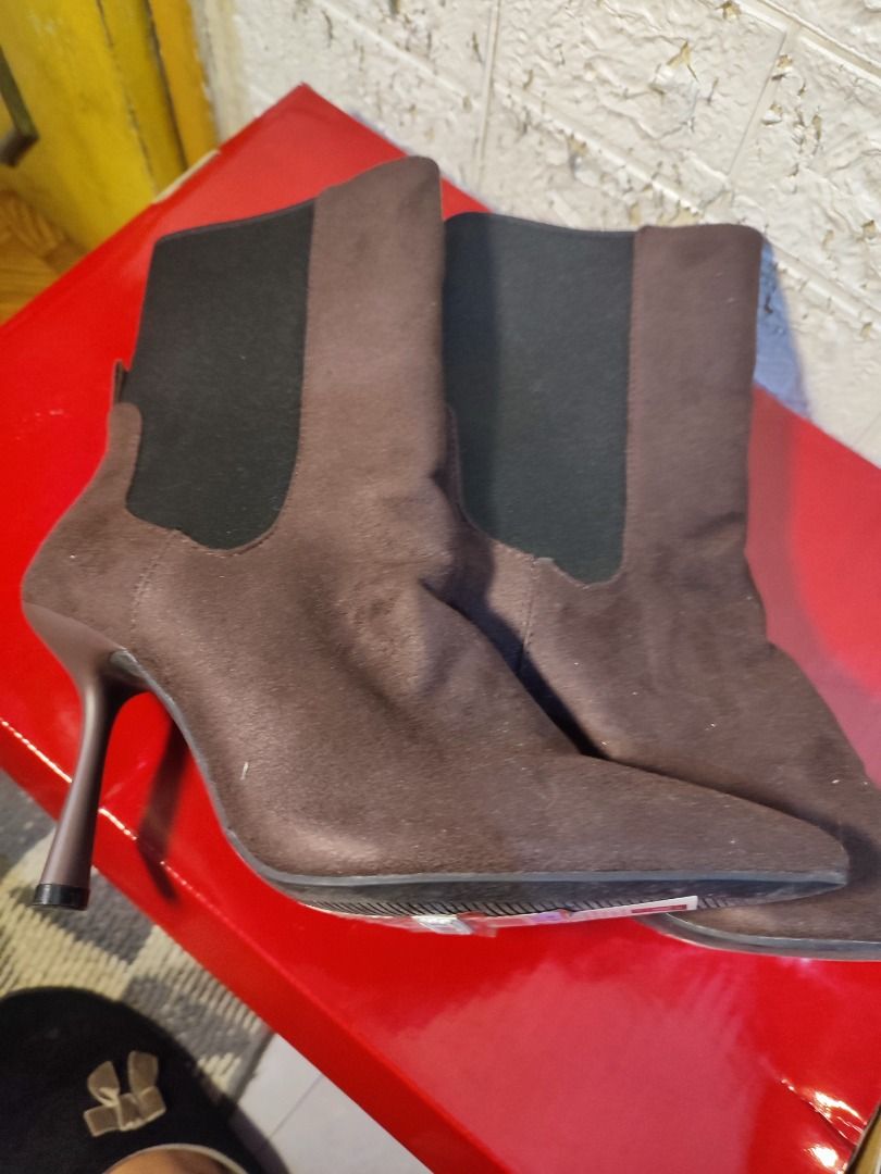 Marks and Spencer Pointed Stiletto Heel Ankle Boots (Category: Boots) located in Caloocan City. Submitted by jel_gielle (Listing ID 1466935083, Image 3). Description: - Brand: Marks and Spencer - Style: Heeled ankle boots with pointed toe and high stiletto heels - Color: Espresso brown - Size: UK 5 / EUR 38 - Features: Stretch elastic side panels for easy wear - Condition: Brand new, never worn, with original store price tag still attached to the