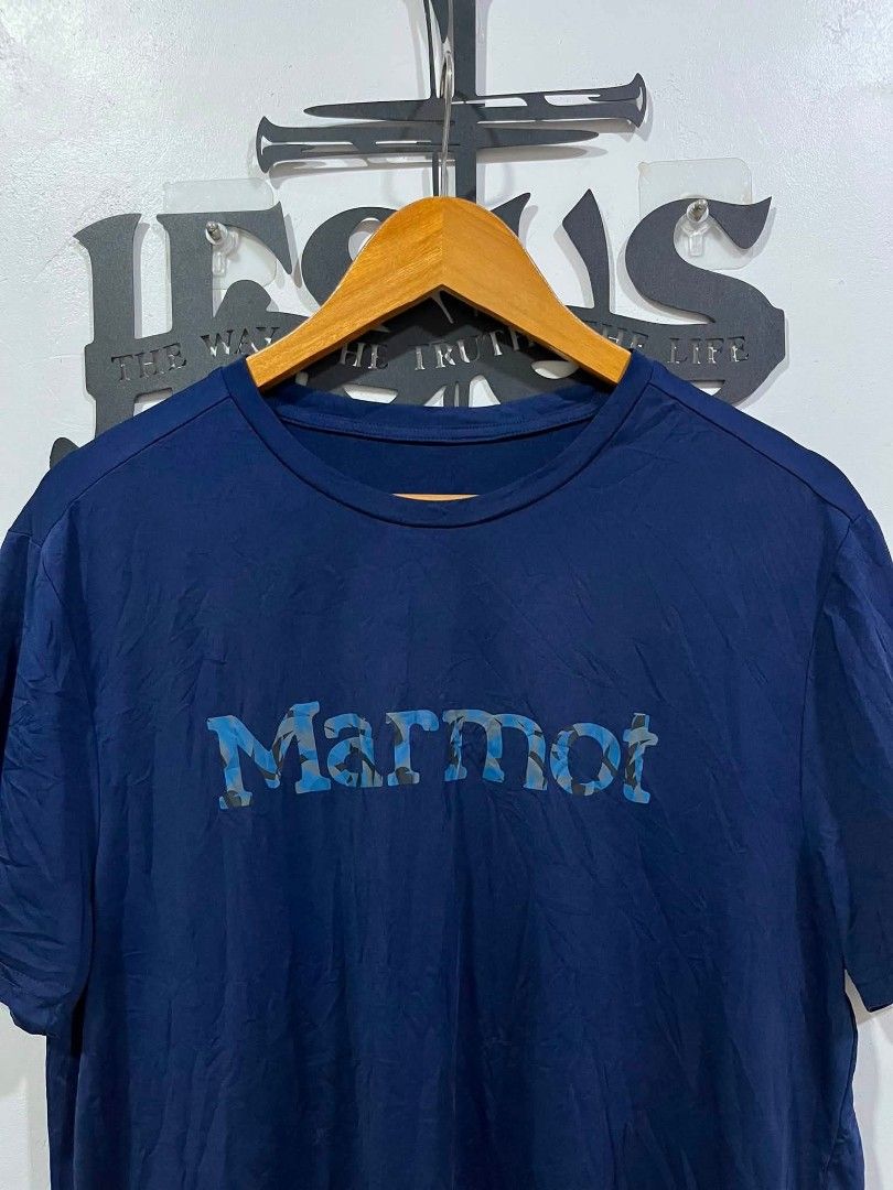 Marmot Dri-fit T-Shirt (Category: Tshirts & Polo Shirts ) located in Manila. Submitted by tristan12_13 (Listing ID 1466945480, Image 2). Description: - Marmot Dri-fit Tshirt - Size: Large - Dimension: W- 20 L- 27 - Condition: Like New - Color: Navy blue with Camou Logo - Used for Running or Hiking .