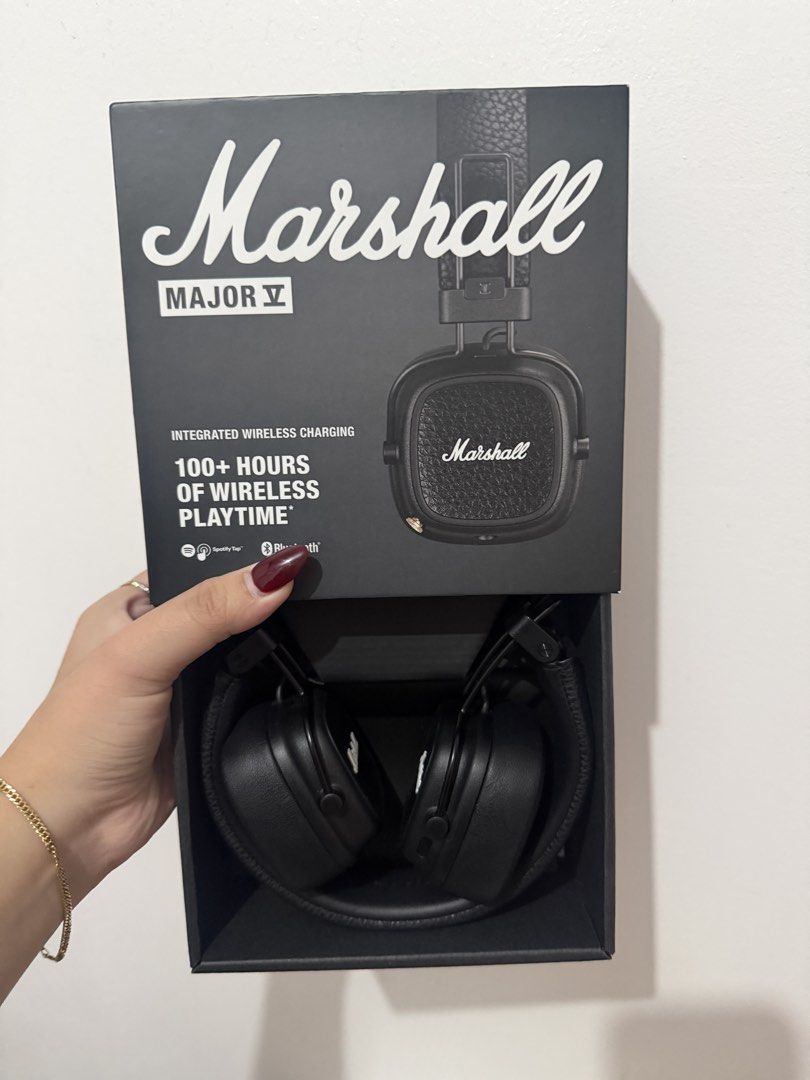 Marshall Major V Headphones (Category: Headphones & Headsets) located in Quezon City. Submitted by sicatnisse (Listing ID 1466803144, Image 1). Description: - Model: Marshall Major V Wireless Headphones - Color: Classic Black with iconic rock style design and textured leather - Battery Life: Over 100 hours of wireless playtime on a single charge - Charging: Convenient integrated wireless charging capability - Inclusions: Comes with the original b
