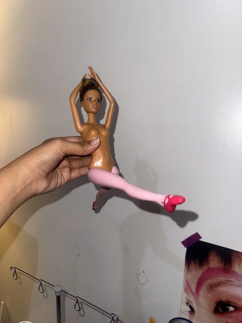 Mattel Barbie Ballerina Doll (Category: Kids Toys) located in Manila. Submitted by cococlio (Listing ID 1466872202, Image 3). Description: - Authentic 2015 Mattel Ballerina Doll - Features lovely brown skin tone and brown hair in a classic bun - Molded pink tights and attached pink toe shoes - Movable arms and legs for various dance poses - Product code DVG16 marked on the back - Great addition to any doll collection.