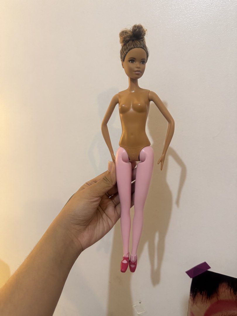 Mattel Barbie Ballerina Doll (Category: Kids Toys) located in Manila. Submitted by cococlio (Listing ID 1466872202, Image 1). Description: - Authentic 2015 Mattel Ballerina Doll - Features lovely brown skin tone and brown hair in a classic bun - Molded pink tights and attached pink toe shoes - Movable arms and legs for various dance poses - Product code DVG16 marked on the back - Great addition to any doll collection.
