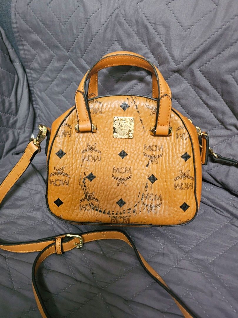 MCM mini boston bag (Category: Shoulder Bags) located in Manila. Submitted by shopaholicmimi (Listing ID 1466957563, Image 1). Description: 📍preloved with minor flaws (please see photos) not ergo, legacy, vintage, soho, saddle, zoe, carly, eastwest, patchwork, rare, canvas, signature, laurel, hobo, kili, rare, coach.