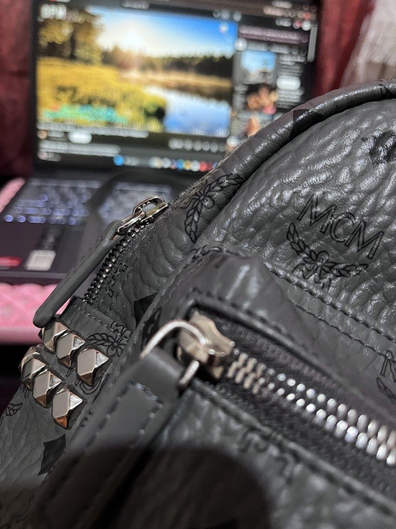 📍Flash Saleee MCM Stark Mini Backpack Grey Studded Monogram (Category: Backpacks) located in Manila. Submitted by madecuratedwithlove11 (Listing ID 1466858200, Image 3). Description: - grey MCM mini backpack with iconic all-over monogram print - Ykk zip -Turnable logo - Edgy studded details on the side pockets for a stylish look - Secure silver-tone hardware and smooth zipper closure - Convenient front zip pocket for quick access to essentials -